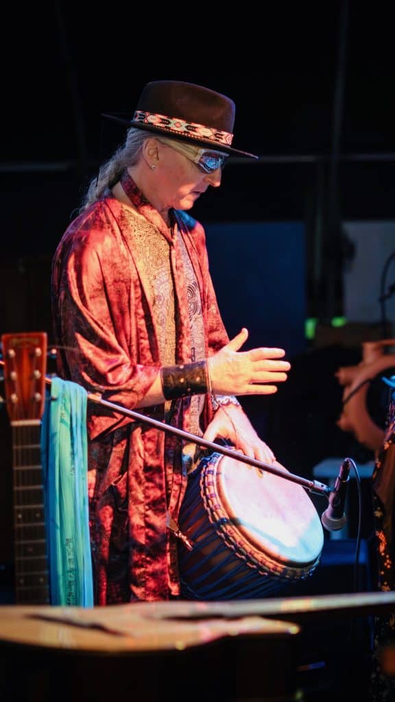 jami with a drum at a movement event